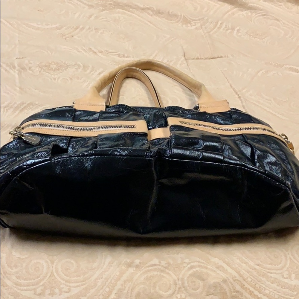 See By Chloe black patent bag with beige accents